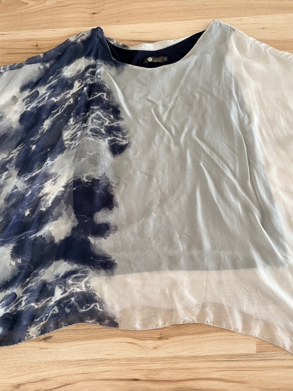 This beautiful a striking, asymmetrical half-tie-dye design .